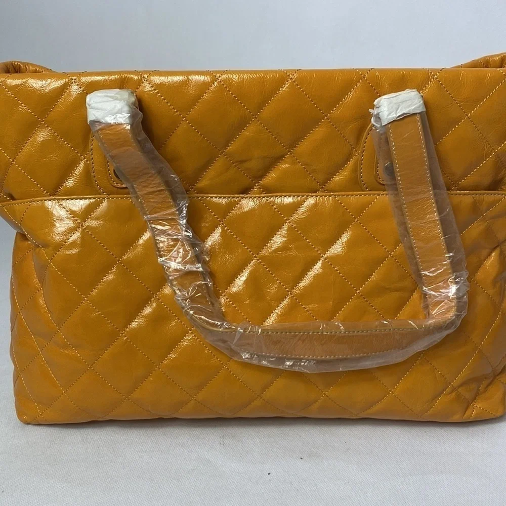Liz Lange orange quilted diaper baby bag NWT
